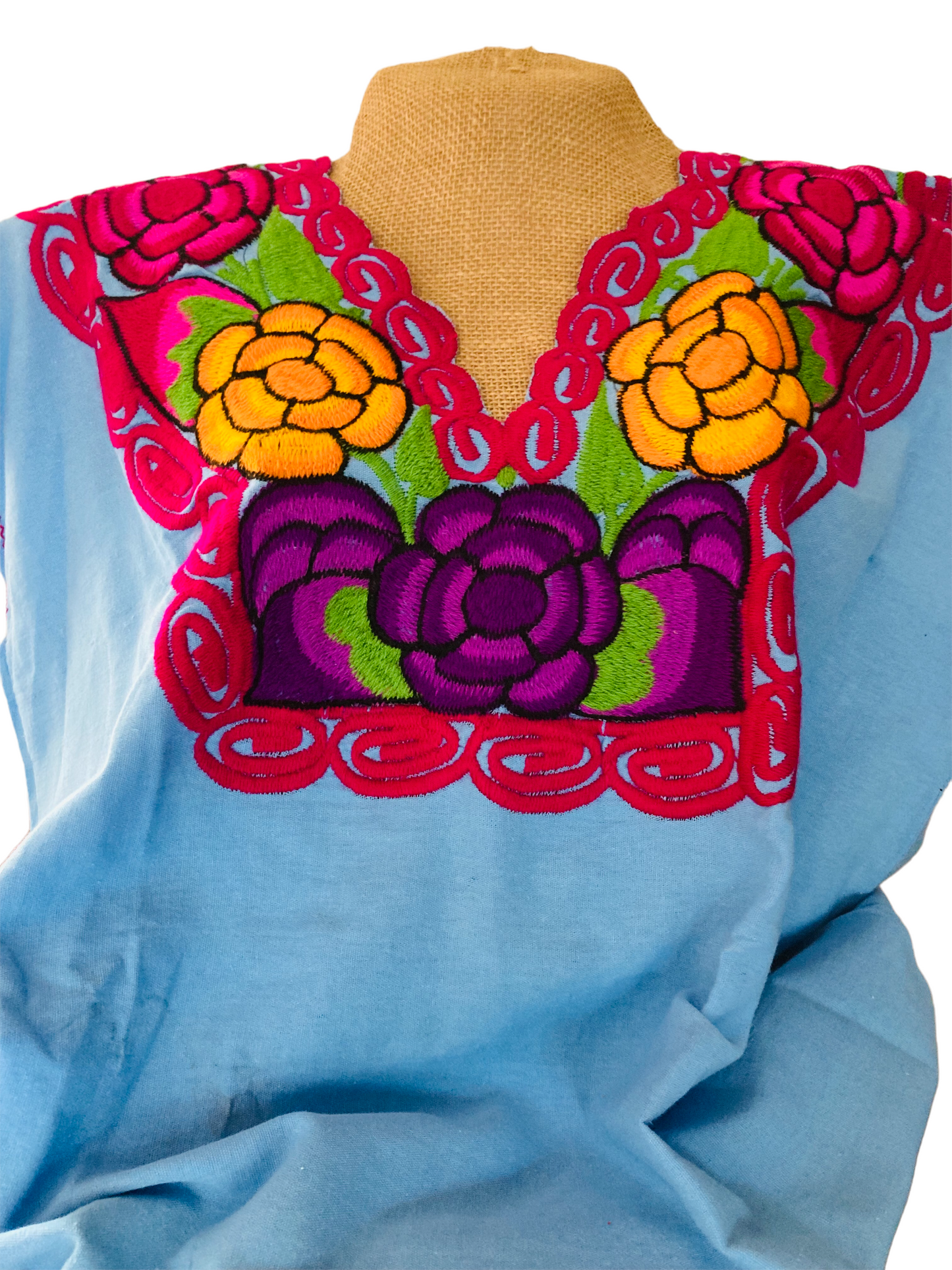 Blusa azul cuello en V bordada